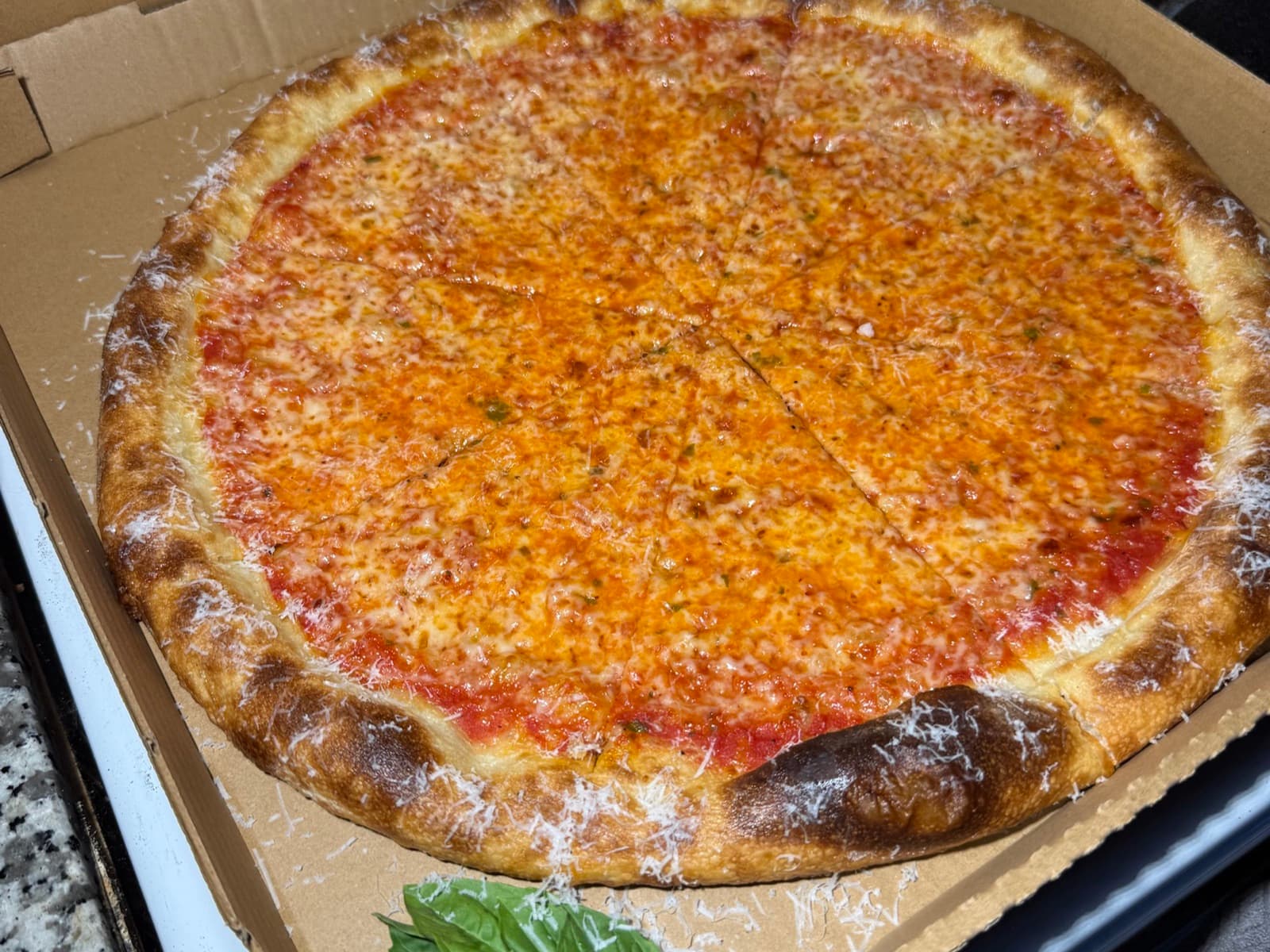 Cheese — a 16-inch thin-and-crispy pie, browned at the crust